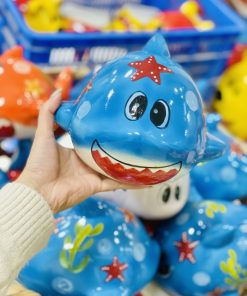 Baby shark màu xanh blue bằng gốm sứ dùng để đút tiền tiết kiệm